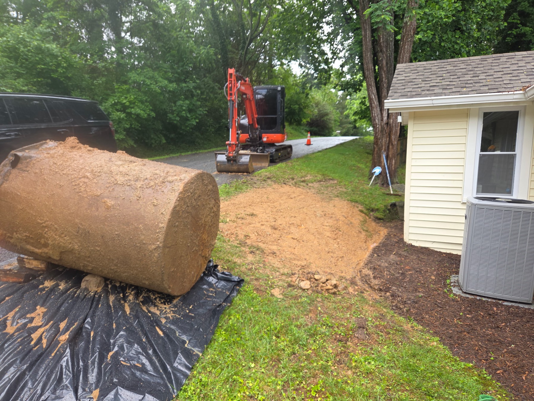 Oil barrel removal by Cress Construction